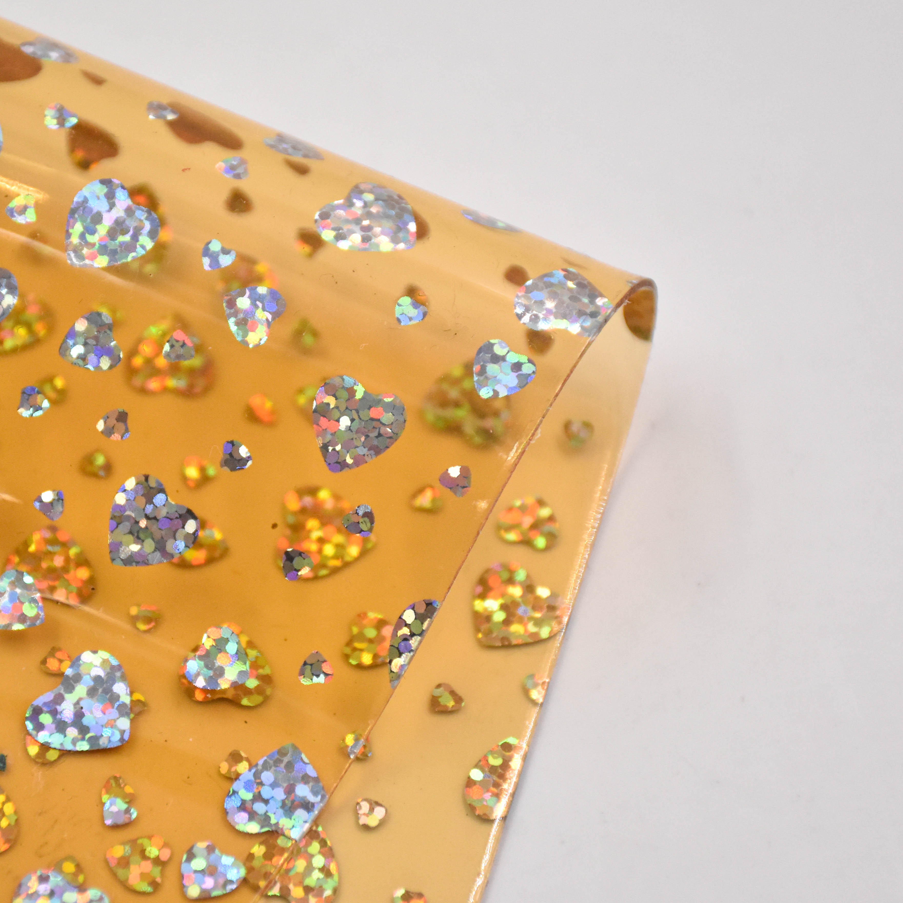 Iridescent Heart Laser-Processed Transparent PVC Film is used for shoes