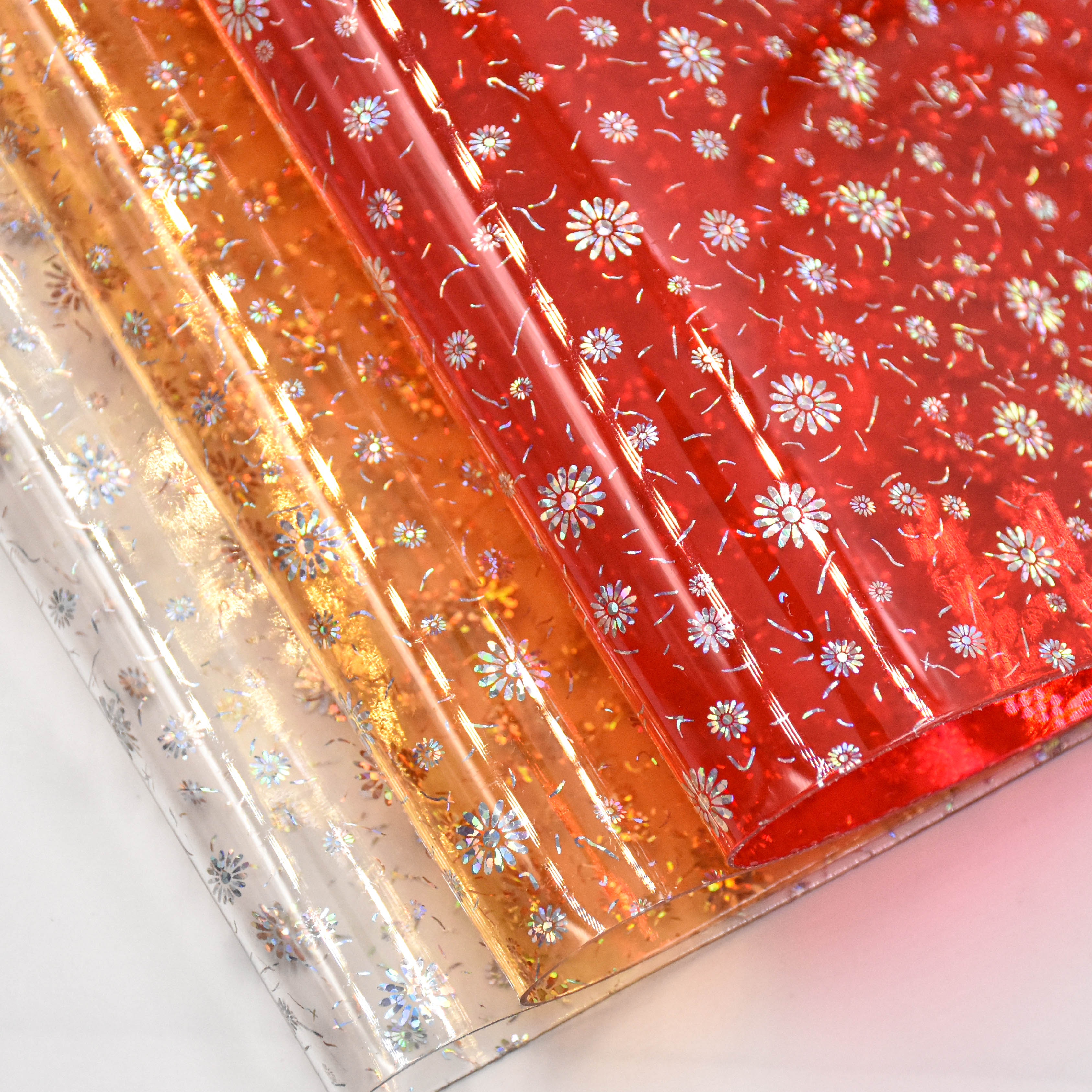 Iridescent Small Daisy Laser-Processed Transparent PVC Film is used for shoes