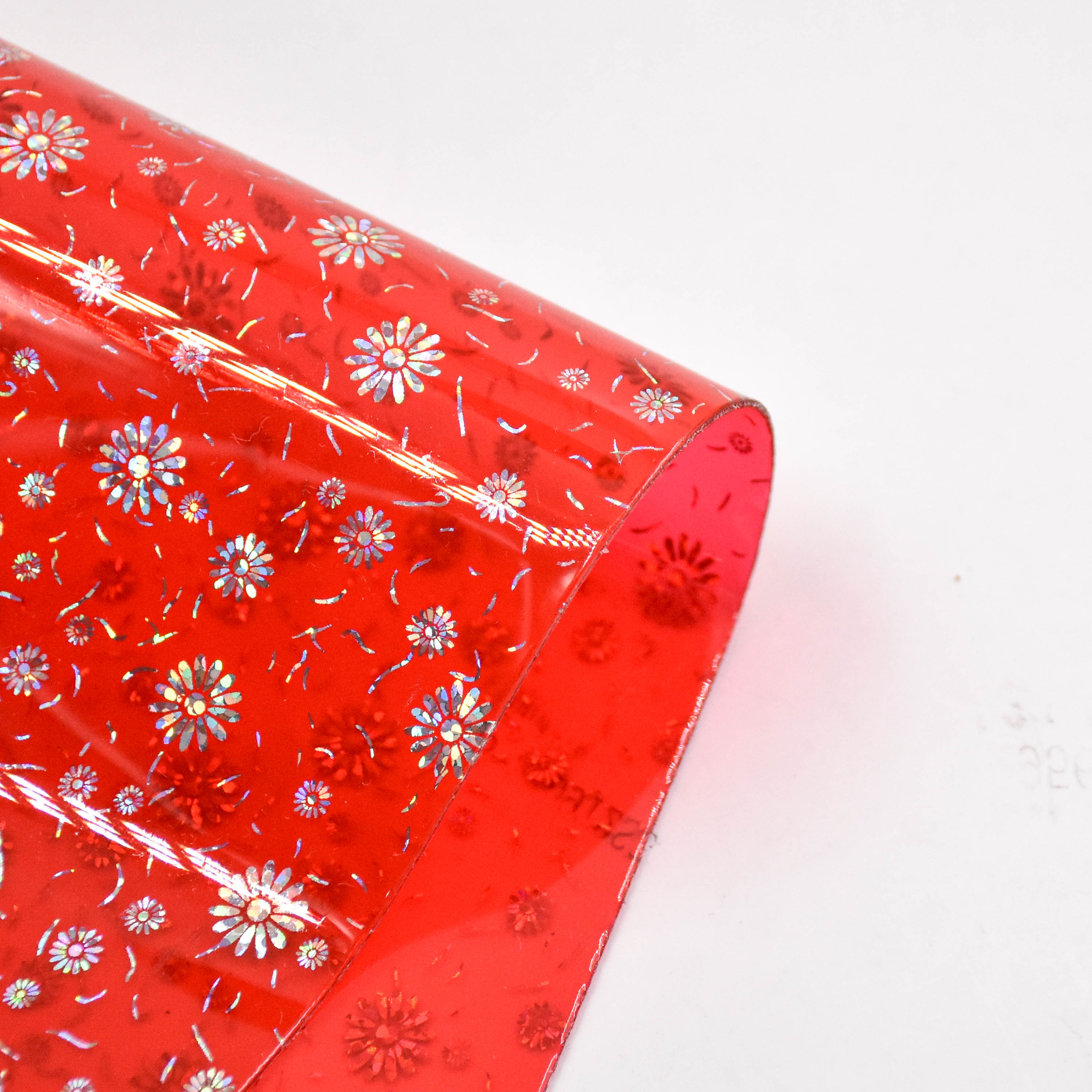 Iridescent Small Daisy Laser-Processed Transparent PVC Film is used for shoes