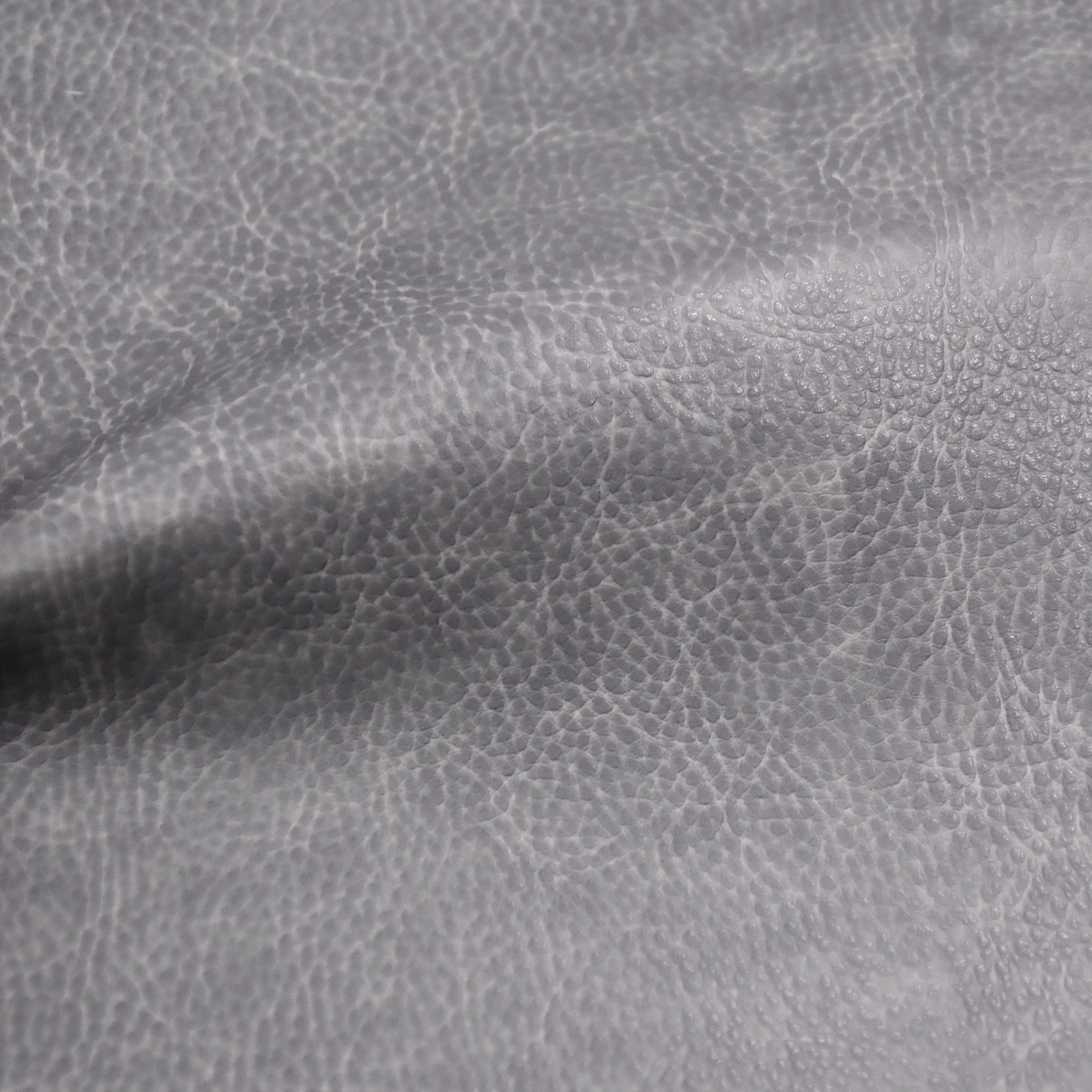 Artificial leather with spunlace soles is used for notebooks