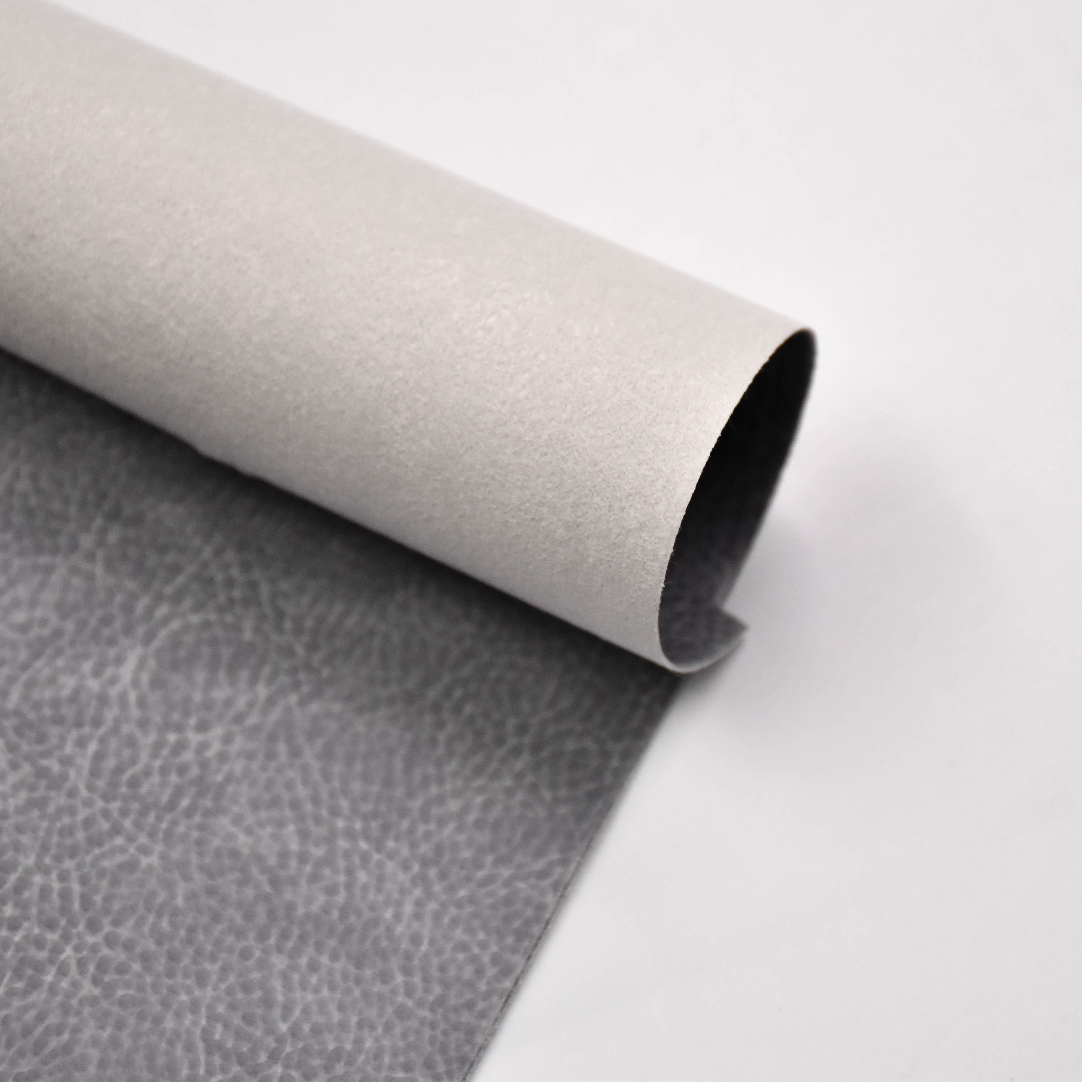 Artificial leather with spunlace soles is used for notebooks