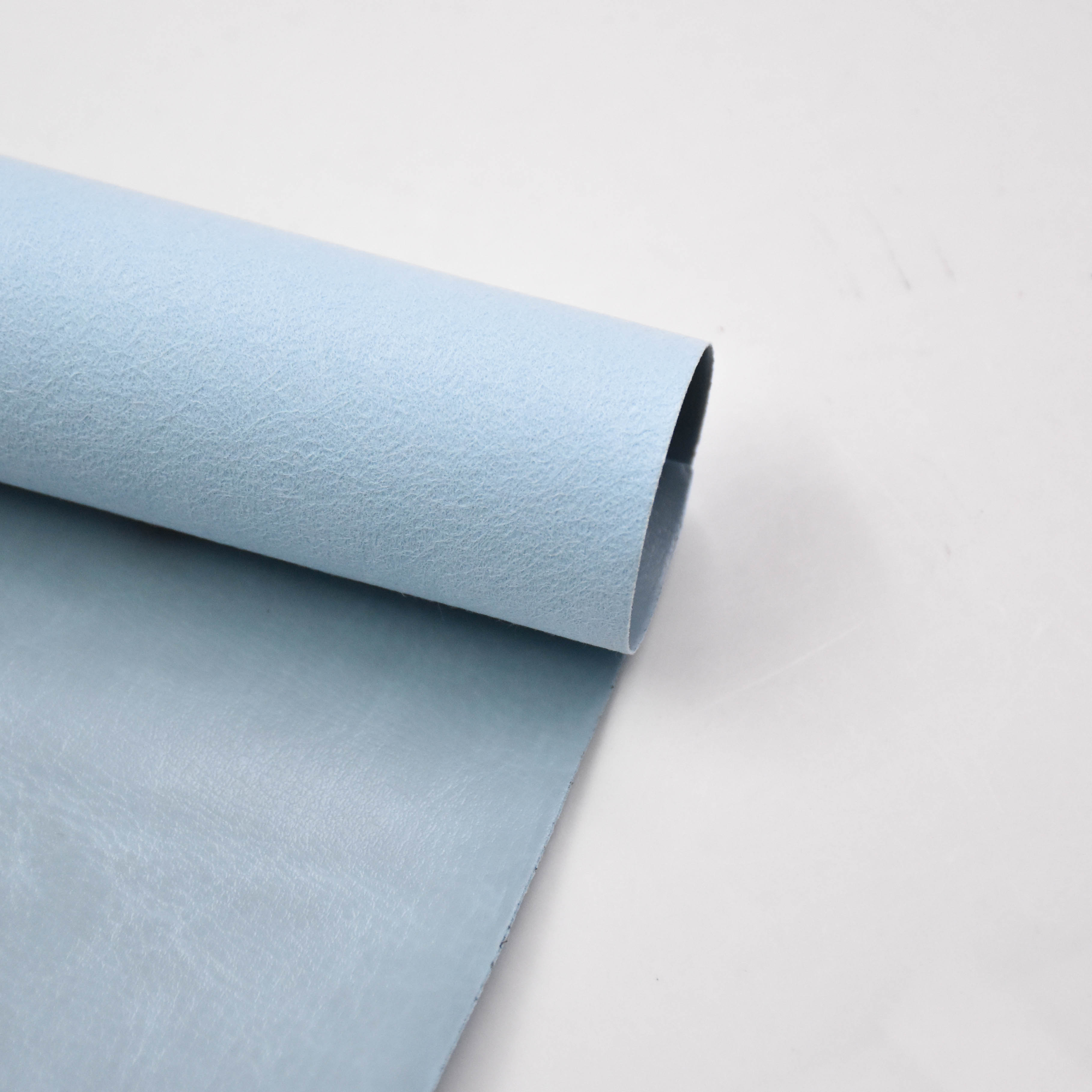 Artificial leather with spunlace soles is used for notebook